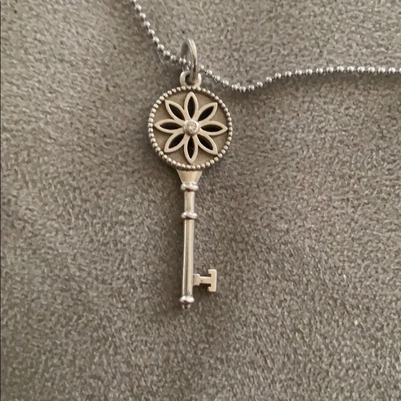 Tiffany & Co. Jewelry - Tiffany silver small daisy key